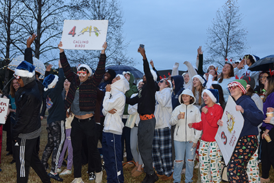 Teams compete against one another during the singing of the 12 Days of Christmas.