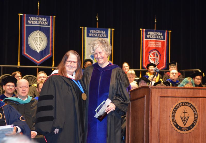 Dr. Margaret Reese receives faculty award for campus service.